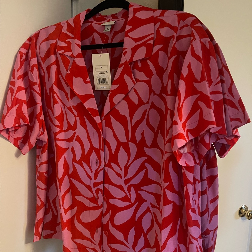 Pink and red Hawaiian print button up shirt.